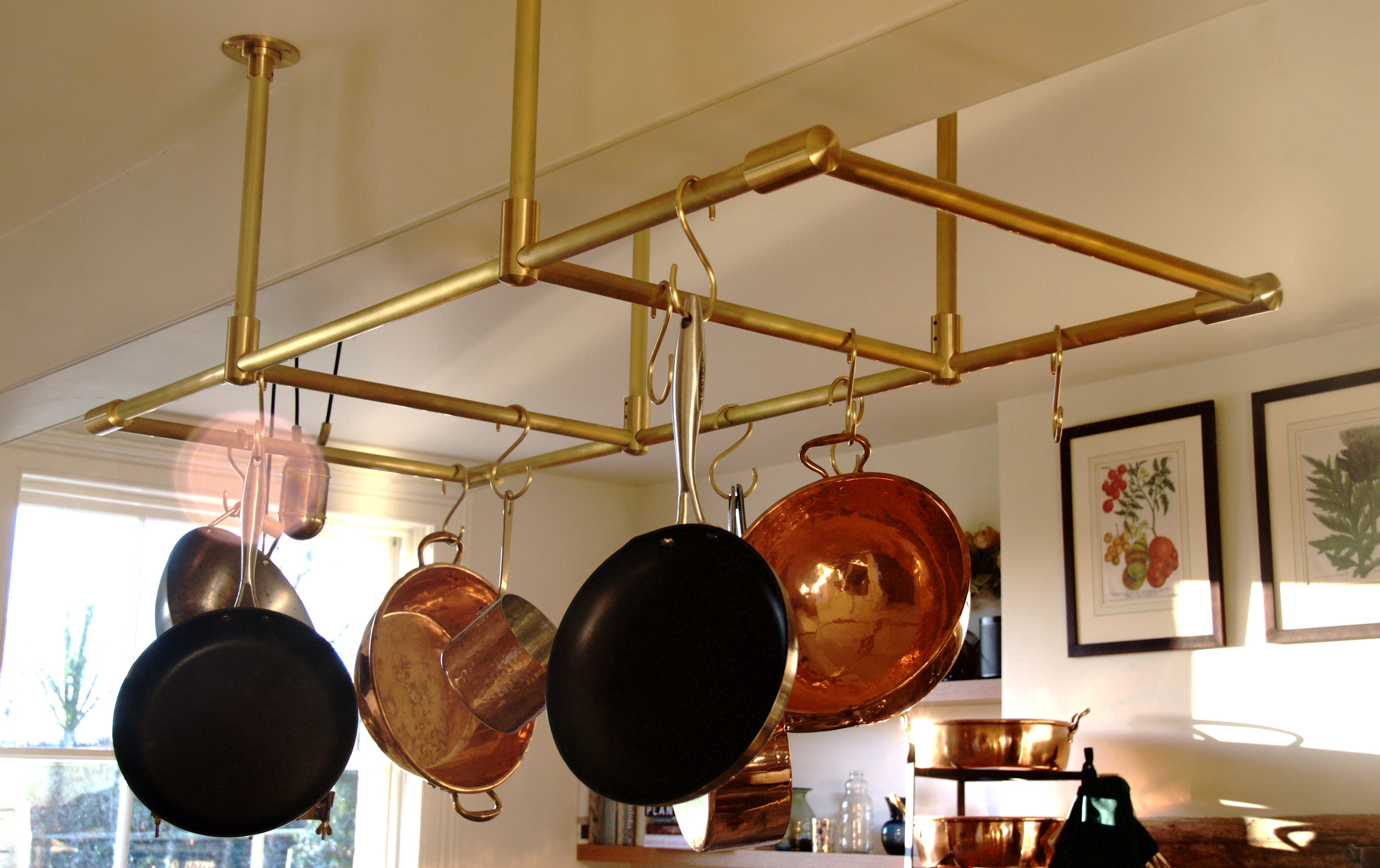 https://www.andrewnebbettdesigns.co.uk/wp-content/uploads/2017/11/Andrew-Nebbett-Designs-Contemporary-Brushed-Brass-Pot-Rack-Ceiling-Mounted.jpg