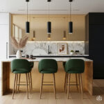 Modern kitchen with custom-made polished brass kitchen cupboards, a brass backsplash, marble countertop, three green bar stools, black pendant lights, minimalist decor, and large windows that let in natural light.