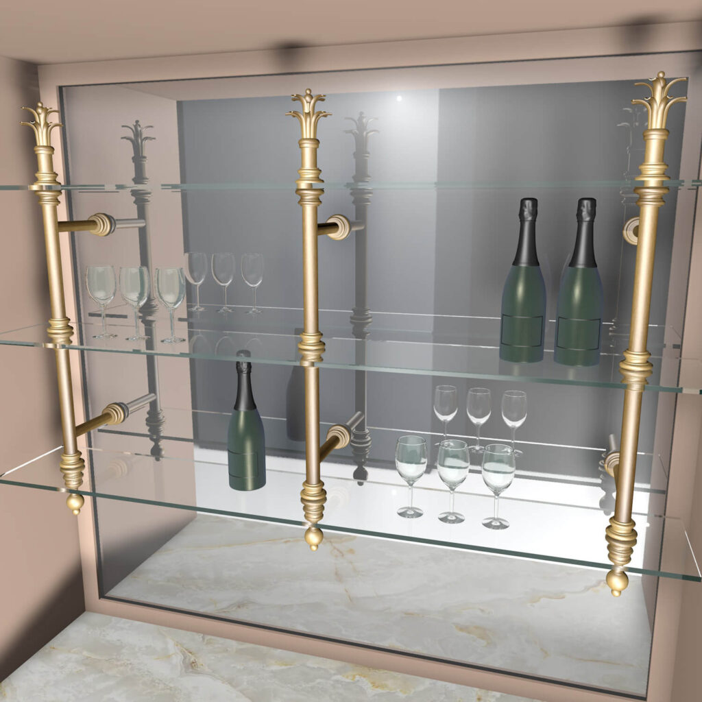 A glass home bar with three shelves holding champagne bottles and empty champagne flutes, supported by ornate brass brackets, set against a marble countertop.